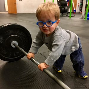 Thomas pulling on 100lbs weights