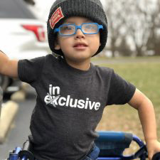 A toddler walking with Spina Bifida