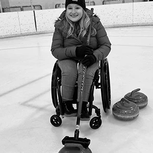 Alexis doing curling on ice